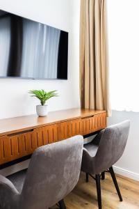 Gemütliche & moderne Ferienwohnung - nur 7 Gehminuten vom Strand entfernt, inklusive Parkplatz und Gartenzugang