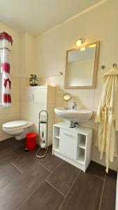 Fewo Mohnblume Lütow Usedom Achterwasser rotes Haus