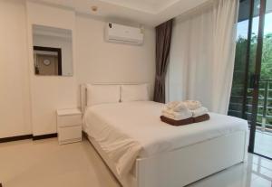 Rawai Beach Condo by Holy Cow