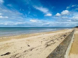 Maisons de vacances Durion, Maison proche plage avec jardin : photos des chambres