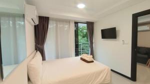 Rawai Beach Condo by Holy Cow