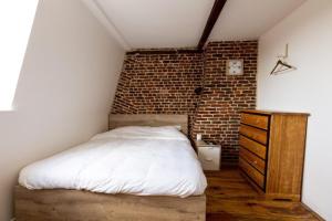 Appartements Vieux Lille triplex de 100 m2 : photos des chambres