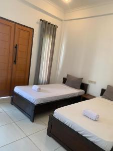 Phòng 2 Giường Đơn Với Phòng Tắm Riêng (Twin Room with Private Bathroom)