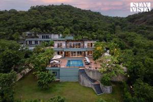 StayVista at La Nirvana with Pool, Music Speaker & Indoor-Outdoor Game