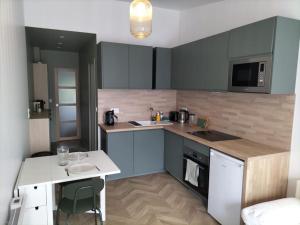 Appartements Charmant T2 Tiny House Lumineux au Coeur de Jouy : photos des chambres