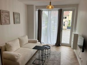 Appartements Charmant T2 Tiny House Lumineux au Coeur de Jouy : photos des chambres