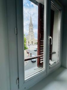 Appartement 2ème étage porte gauche vue sur la Basilique