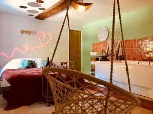 Sejours chez l'habitant Jacuzzi et Vue sur Loire - Maison d'hotes L'Odyssee : photos des chambres
