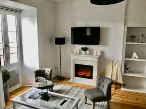 Appartements En face de l-hotel Normandy - Appartement dernier etage : photos des chambres