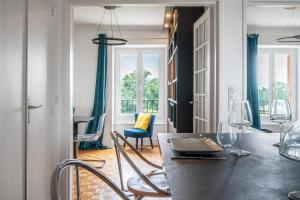 Appartements Le Versailles Suite classe 3 etoiles Vue Chateau & Potager : photos des chambres
