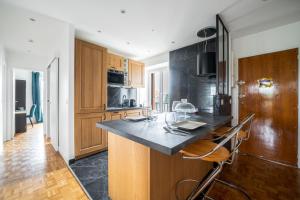 Appartements Le Versailles Suite classe 3 etoiles Vue Chateau & Potager : photos des chambres