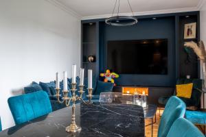 Appartements Le Versailles Suite classe 3 etoiles Vue Chateau & Potager : photos des chambres