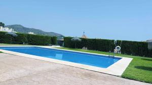 Gran Terraza con Vistas al Mar y Piscina