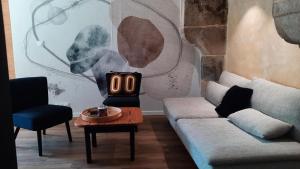 Appartements Le Duclos, appartement rez-de-jardin Dinan centre : photos des chambres