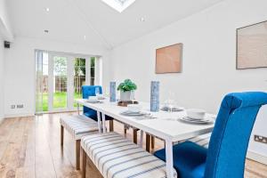 Charming 5BR Home with Garden & Parking