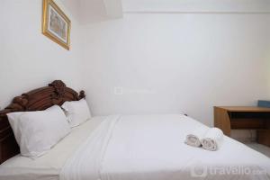 Cozy and Homey Studio Apartment at Margonda Residence 1 By Travelio