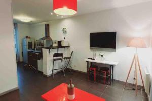 Appartements HOMEYPIC T3 en rez de jardin proche de Lyon : photos des chambres