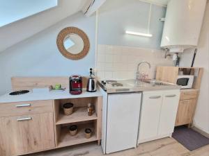 Appartements Chez Clovis - proche gare centre et arena : photos des chambres