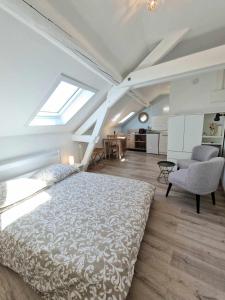 Appartements Chez Clovis - proche gare centre et arena : photos des chambres