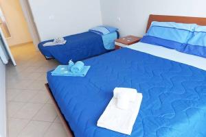 Tutto intorno Mare, parcheggio privato, negozi