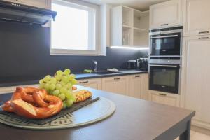 Appartements Le Spot, proche Euroairport : photos des chambres