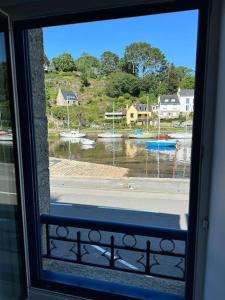 Maisons de vacances Sur le Quai - Vue sur le port - Exterieur Cosy : photos des chambres