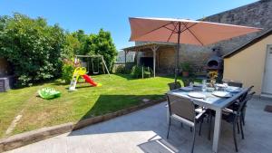 Maisons de vacances Le So Wild, maison avec jardin clos, terrasse amenagee, 5 mn a pied commerce, terrain de tennis, a 800 m de la plage d'Omaha beach jeux arcade, jouets, materiel jeunes enfants enfants, table ping-pong : photos des chambres