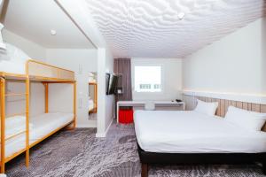 Standard Room with One Double Bed and Two Single Beds room in ibis Luxembourg Aeroport