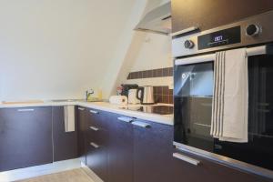 Appartements {L'Essentiel}, calme, proche autoroute : photos des chambres