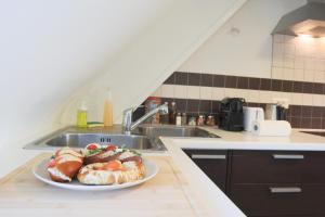 Appartements {L'Essentiel}, calme, proche autoroute : photos des chambres