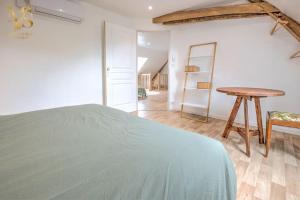 Maisons de vacances Aux Cotes des Chenes Piscine et Nature : photos des chambres
