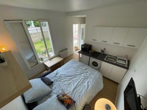 Appartements Studio cosy a 20 min de Paris : photos des chambres