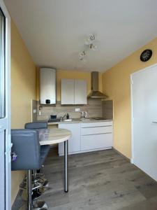 Appartements Le nid des hirondelles : photos des chambres