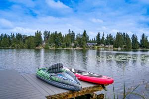 Lakefront Lynnwood Home with Balconies and Shared Dock