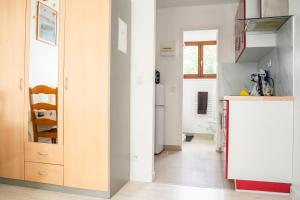Appartements Qhome 1 - Studio entre Paris et Disney : photos des chambres