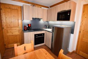 Résidence Lodges Des Alpages - 3 Pièces 6 pers - LES LODGES DES ALPAGES - 413LDGA - PLAGNE SOLEIL MAE-4284