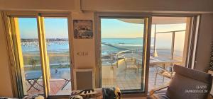 Appartements KerLorandeEvens, face mer, parking : photos des chambres