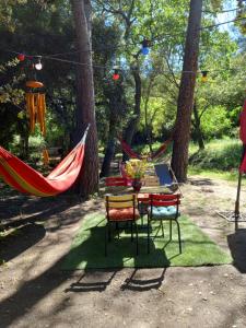 Tentes de luxe La roulotte du petit paradis : photos des chambres