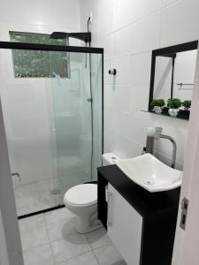Suíte Conforto com AR, TV e sacada em Florianópolis