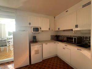 Spacieux T2 climatisé avec véranda, 150m plage, PKG, au cœur de la Grande Plage - 4 personnes - FR-1-799-20