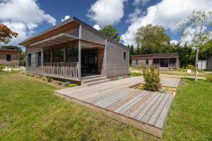 Villages vacances Les Cottages de La Baule : Chalet de standing 7 personnes - Piscine : photos des chambres