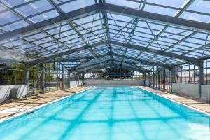 Villages vacances Les Cottages de La Baule : Chalet de standing 7 personnes - Piscine : photos des chambres