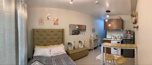 Studio 128 Condominium