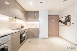 Stunning 1BR Apartment in Azizi Riviera 42, Al Merkadh by Deluxe Holiday Homes