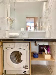 Appartements Home Chic Home - Les Suites de La Comedie : photos des chambres