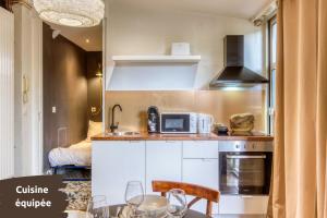 Appartements L-Atelier de l-Artiste - Lumineux - Calme - Wifi : photos des chambres