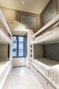 Bed in 8-Bed Mixed Dormitory Room room in Little Italy Boutique Hostel