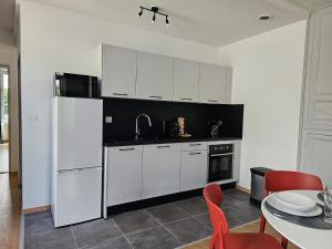 Appartements Aux-Cerfs - A deux pas de l-Abbaye : photos des chambres