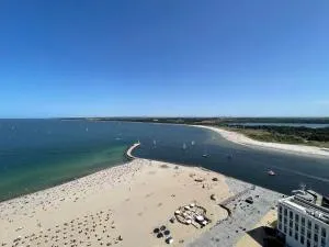 Wind und Meer, 3-Zimmer Ecksuite in der Maritim Residenz Travemünde - Прівалль