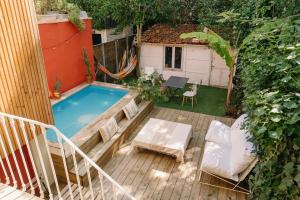 Maisons de vacances Charmante petite maison avec piscine : photos des chambres